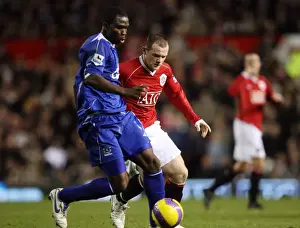Manchester United v Everton Joseph Yobo Everton in action against Wayne Rooney