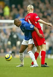 Everton 1 Liverpool 0 Collection: Marcus Bent shields the ball from Sami Hyypia