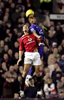 2005 Prints: Marcus Bent Soars Over Rio Ferdinand: An Epic Football Moment