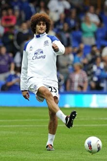 Images Dated 20th August 2011: Marouane Fellaini in Action: Everton vs. Queens Park Rangers, Premier League Clash (2011)
