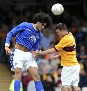 Season 2012-13 Prints: Marouane Fellaini: Clearing the Path for Everton in Pre-Season Friendly against Motherwell at Fir Park Stadium