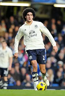 Marouane Fellaini Prints: Marouane Fellaini: Everton's Unstoppable Midfield Powerhouse