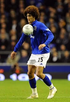 Images Dated 26th October 2011: Marouane Fellaini Leads Everton's Charge Against Chelsea in Carling Cup Fourth Round at Goodison