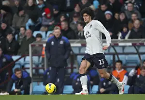 Framed Print : Marouane Fellaini: Thunderous Performance at Everton vs. Aston Villa, Barclays Premier League (14 January 2012) Framed Print : Marouane Fellaini: Thunderous Performance at Everton vs. Aston Villa, Barclays Premier League (14 January 2012)