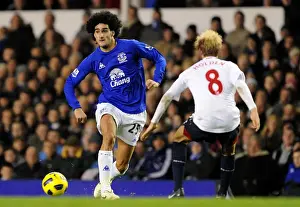 Marouane Fellaini Prints: Marouane Fellaini vs. Stuart Holden: A Premier League Showdown at Goodison Park (10 November 2010)