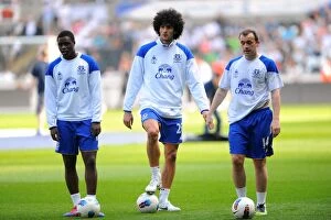 24 March 2012 v Swansea City, Liberty Stadium Collection: Marouane Fellaini's Focused Warm-Up Ahead of Everton's Clash with Swansea City (BPL, 24 March 2012)