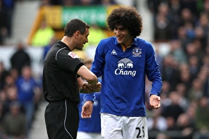 Framed Print : Marouane Fellaini's Heated Confrontation with Referee Andre Marriner during FA Cup Sixth Round Match at Goodison Park Framed Print : Marouane Fellaini's Heated Confrontation with Referee Andre Marriner during FA Cup Sixth Round Match at Goodison Park