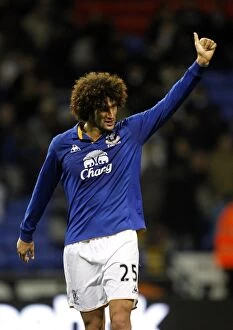 Images Dated 26th November 2011: Marouane Fellaini's Heroic Performance: Everton's Victory over Bolton Wanderers in the Barclays