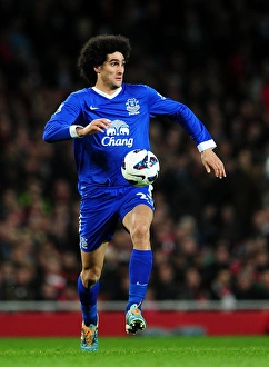 Marouane Fellaini's Intense Face-Off in the Scoreless Arsenal vs. Everton Barclays Premier League Match at Emirates Stadium (16-04-2013)