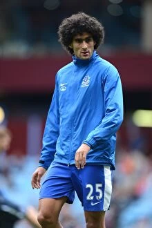 Images Dated 25th August 2012: Marouane Fellaini's Stellar Performance: Everton's 3-1 Victory over Aston Villa (August 25, 2012)