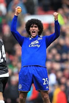 Images Dated 22nd April 2012: Marouane Fellaini's Thrilling Celebration: Everton Secures a Dramatic Draw at Old Trafford