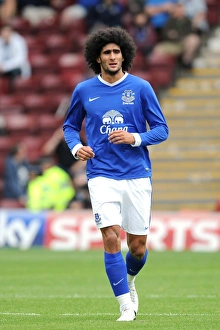 Season 2012-13 Prints: Marouane Fellaini's Thrilling Performance: Everton's Pre-Season Clash at Motherwell's Fir Park Stadium