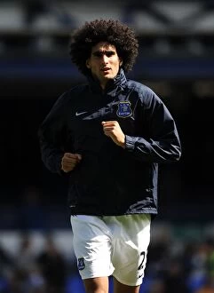 Images Dated 24th August 2013: Marouane Fellaini's Unyielding Performance: Everton vs. West Bromwich Albion's Stalemate at