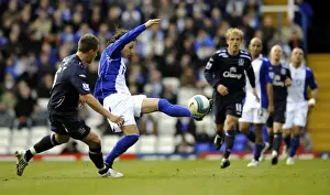 Framed Print : Mauro Zarate Slips Past Jagielka: Birmingham's Edge over Everton in Barclays Premier League Framed Print : Mauro Zarate Slips Past Jagielka: Birmingham's Edge over Everton in Barclays Premier League