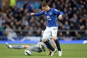 Everton v Newcastle United - Goodison Park Collection: McCarthy vs. Gutierrez: Premier League Battle at Goodison Park