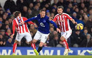 Everton V Stoke City - Goodison Park Prints: McCarthy's Battle: Everton vs Stoke City - Everton's James McCarthy Fights for Possession
