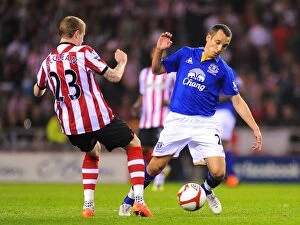 Images Dated 27th March 2012: McClean vs. Osman: FA Cup Sixth Round Replay Showdown - Sunderland vs. Everton (27 March 2012)
