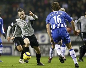 Images Dated 31st January 2006: McFadden vs. De Zeeuw: A Football Battle at Everton