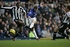 James McFadden Prints: McFadden's Determination: Focused Shot Amidst Babayaro's Defensive Pressure