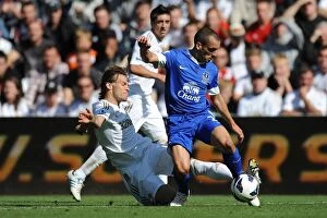 Images Dated 22nd September 2012: Michu Fouls Osman: Everton's Triumphant 3-0 Over Swansea City (September 22, 2012)
