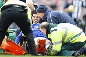 Images Dated 22nd February 2009: Mikel Arteta Suffers Injury, Stretchered Off the Field: Newcastle United vs. Everton, 2009