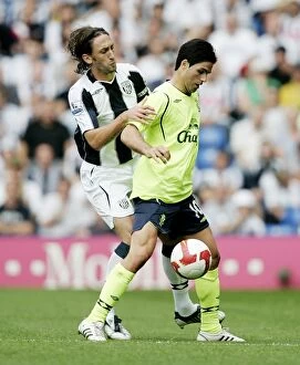 West Brom v Everton Collection: Mikel Arteta vs. Jonathan Greening: A Battle at The Hawthorns - West Bromwich Albion vs