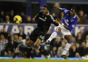 Everton v Chelsea Collection: Mikel vs Yobo: A Battle of Midfield Giants - Everton vs Chelsea, Barclays Premier League