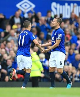 Images Dated 30th August 2014: Mirallas and Jagielka Celebrate First Goals in Everton's Victory Over Chelsea