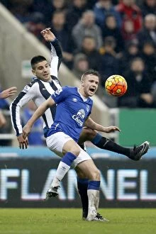Images Dated 26th December 2015: Mitrovic vs. Cleverley: A Battle for Supremacy - Newcastle United vs