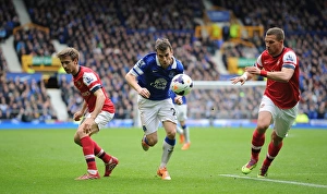 Everton 3 V Arsenal 0 : Goodison Park : 06-04-2014 Prints: Monreal, Podolski, and Coleman's Intense Battle: Everton's Victory Over Arsenal (3-0)