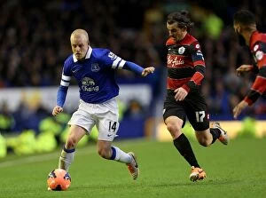 Images Dated 4th January 2014: Naismith vs Barton: Everton's Dominant FA Cup Victory over Queens Park Rangers (4-0)