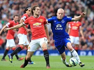 Images Dated 5th October 2014: Naismith vs Blind: A Football Battle at Old Trafford