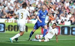Images Dated 19th September 2015: Naismith vs. Naughton: A Battle for Ball Possession - Everton vs. Swansea, Premier League