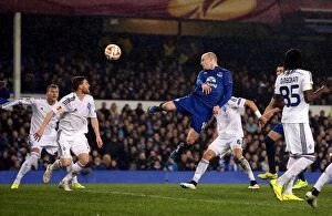Images Dated 12th March 2015: Naismith's Header: Everton vs Dynamo Kiev in Europa League Showdown