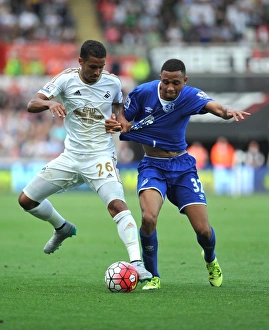 Swansea City V Everton - Liberty Stadium Prints: Naughton vs. Browning: Intense Battle in Swansea vs. Everton Premier League Clash