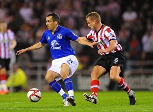 Images Dated 27th March 2012: Osman vs Cattermole: A Fiery FA Cup Clash Between Sunderland and Everton
