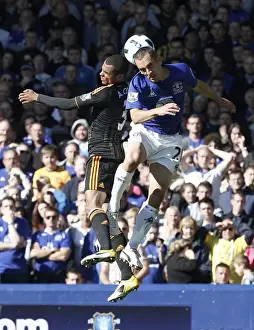 Framed Print : Osman vs. Cole: A Premier League Battle at Goodison Park (22 May 2011) Framed Print : Osman vs. Cole: A Premier League Battle at Goodison Park (22 May 2011)