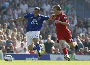 01 October 2011 Everton v Liverpool Collection: Osman vs Leiva: A Premier League Battle for the Ball at Goodison Park (1 October 2011)