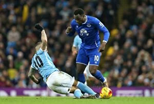 Images Dated 27th January 2016: Otamendi vs. Lukaku: A Battle to Reach the Capital One Cup Final at Etihad Stadium