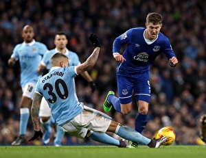 Capital One Cup Prints: Otamendi vs. Stones: A Battle for Supremacy in the Capital One Cup Semi-Final Clash between Manchester City and Everton