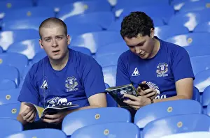 01 October 2011 Everton V Liverpool Prints: Passionate Rivalry: Everton vs Liverpool at Goodison Park (2011) - A Sea of Unwavering Fan Devotion