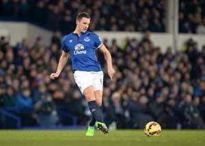 Images Dated 19th January 2015: Phil Jagielka in Action: Everton vs. West Bromwich Albion at Goodison Park - Barclays Premier League