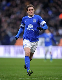 FA Cup Prints: Phil Jagielka: Everton's Heroic Leader in FA Cup Victory over Bolton Wanderers (January 26)