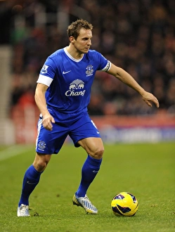 Stoke City 1 V Everton 1 : Britannia Stadium : 15-12-2012 Prints: Phil Jagielka Faces Off: Everton vs. Stoke City Draw at Britannia Stadium (15-12-2012)