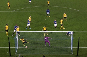 Framed Print : Phil Jagielka Scores Everton's Second Goal in Europa League Match Against Lille
