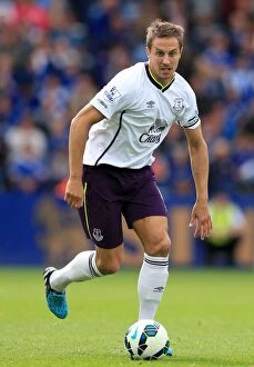 Images Dated 16th August 2014: Phil Jagielka vs Leicester City: Everton's Defender in Action at King Power Stadium - Barclays