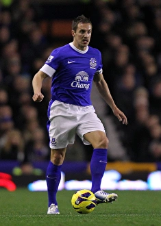 Everton 1 V Arsenal 1 : Goodison Park : 28-11-2012 Prints: Phil Jagielka's Defiant Performance: Everton Holds Arsenal to a Draw at Goodison Park (28-11-2012)