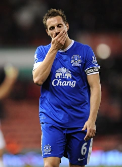 Stoke City 1 V Everton 1 : Britannia Stadium : 15-12-2012 Prints: Phil Jagielka's Determined Face-off Against Stoke City in the Barclays Premier League Draw (December 15)