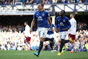 Images Dated 18th October 2014: Phil Jagielka's Thunderbolt: Everton's Historic First Goal vs. Aston Villa in Premier League