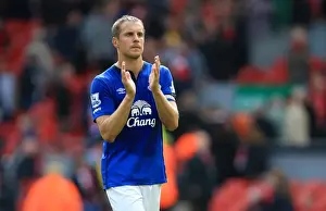 Phil Jagielka's Triumphant Moment: Everton's Victory Celebration at Anfield - Barclays Premier League